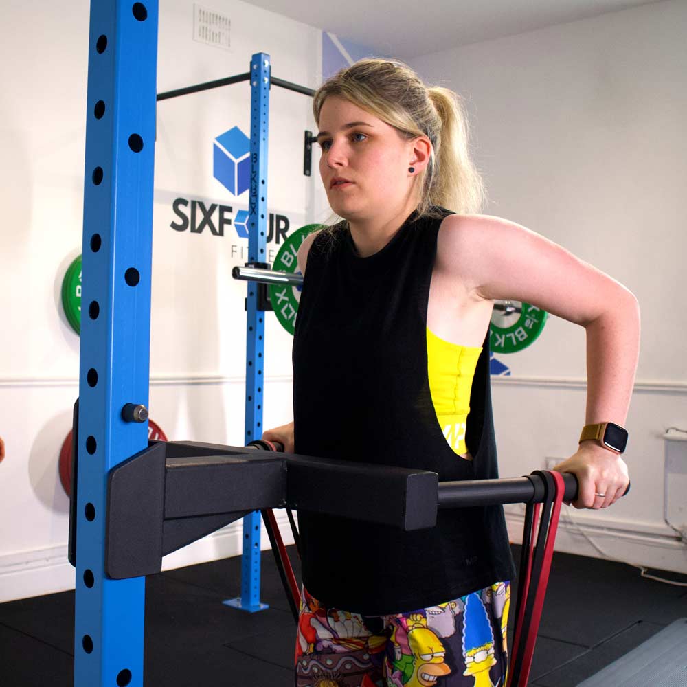 A woman training with confidence at SixFour Fitness
